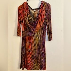 Beautiful & colorful 3/4 sleeve mini dress with snake skin pattern.